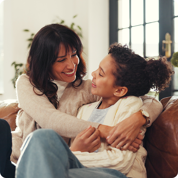 Mother and daughter sharing a warm embrace
