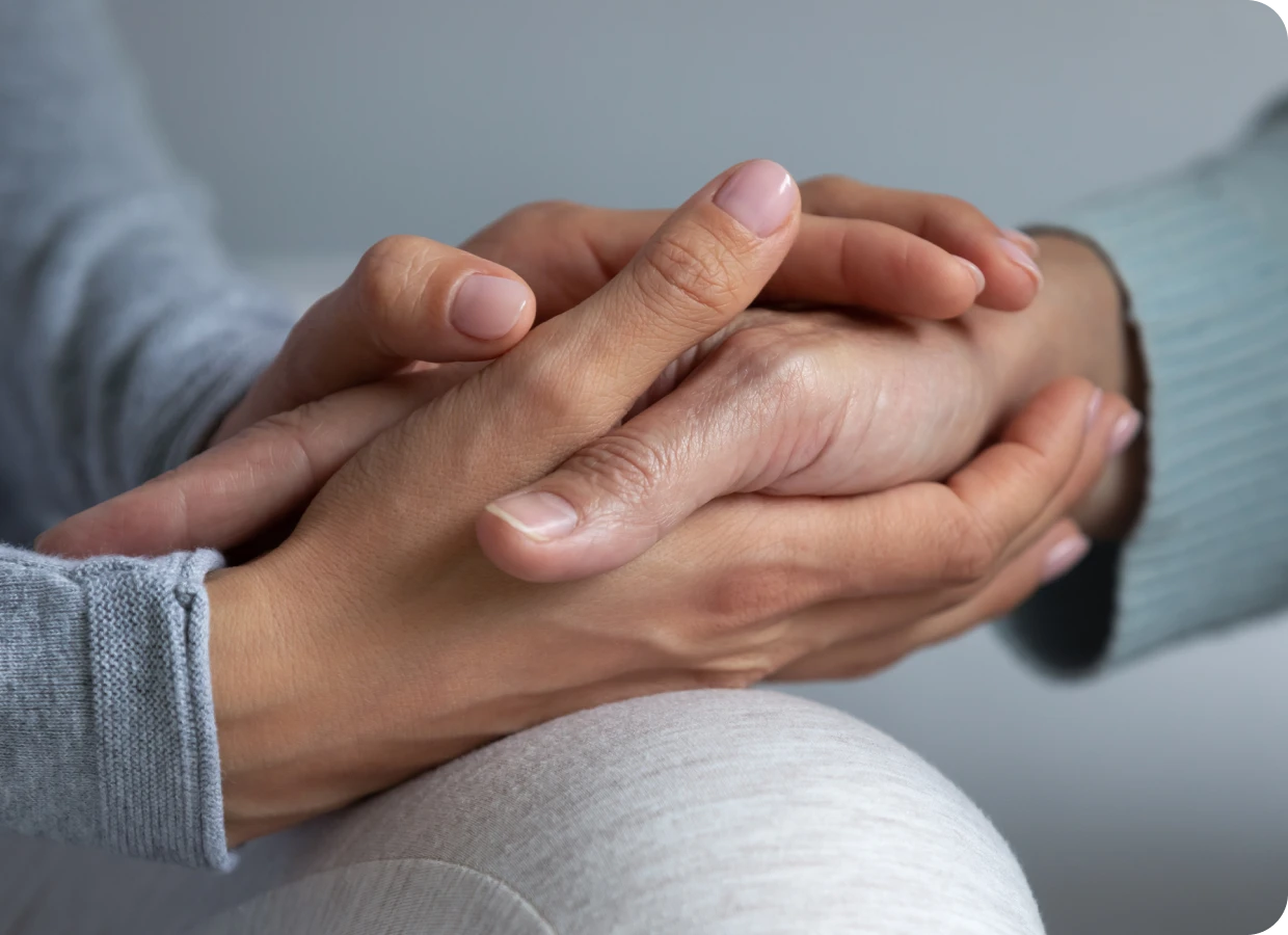 Close-up of hands in embrace